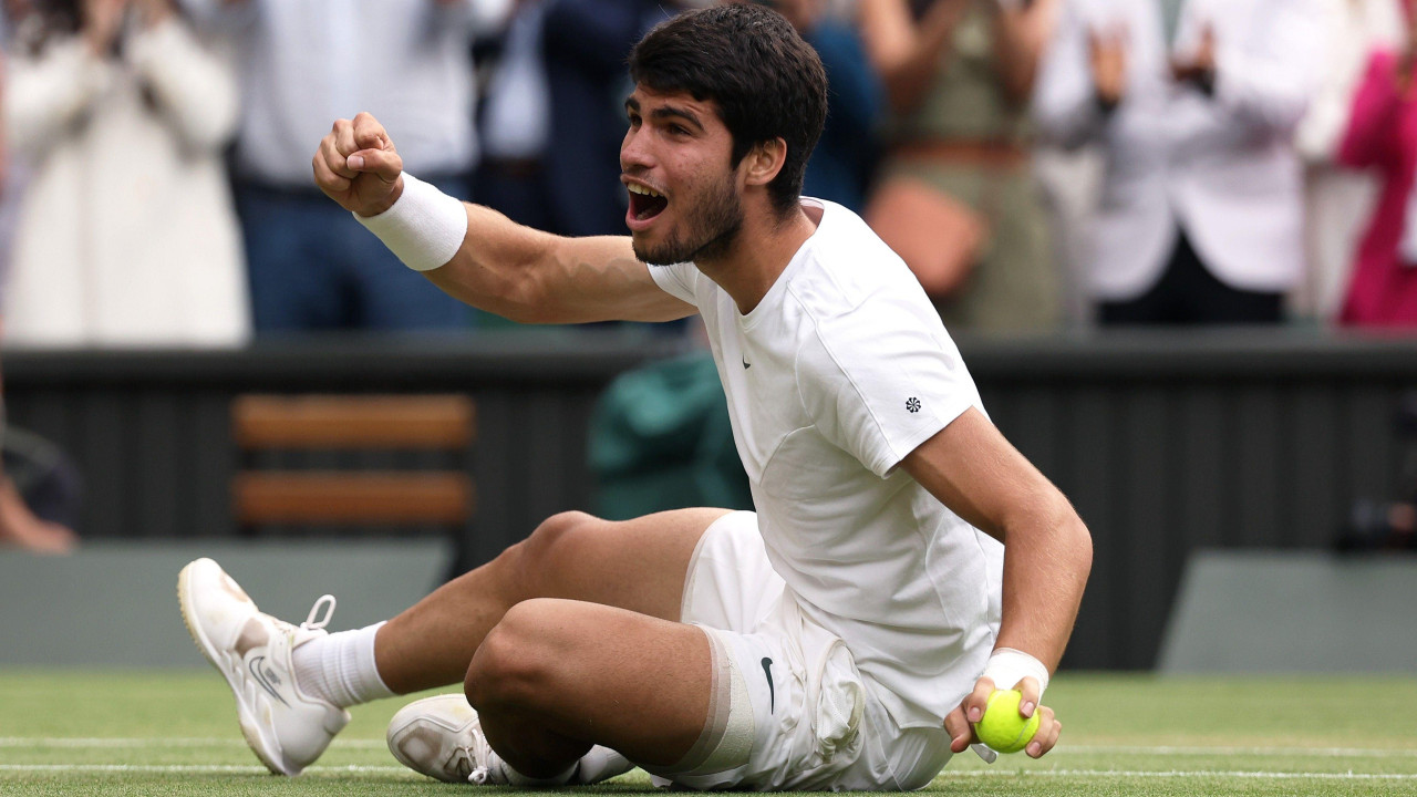 Carlos Alcaraz reacts after winning Wimbledon in 2023